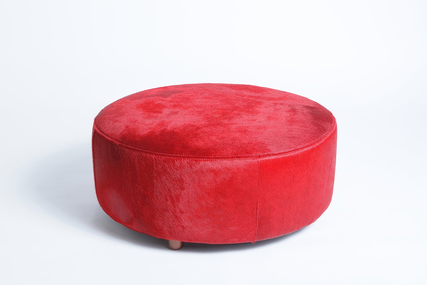 Round Cowhide Ottoman - HearthHub