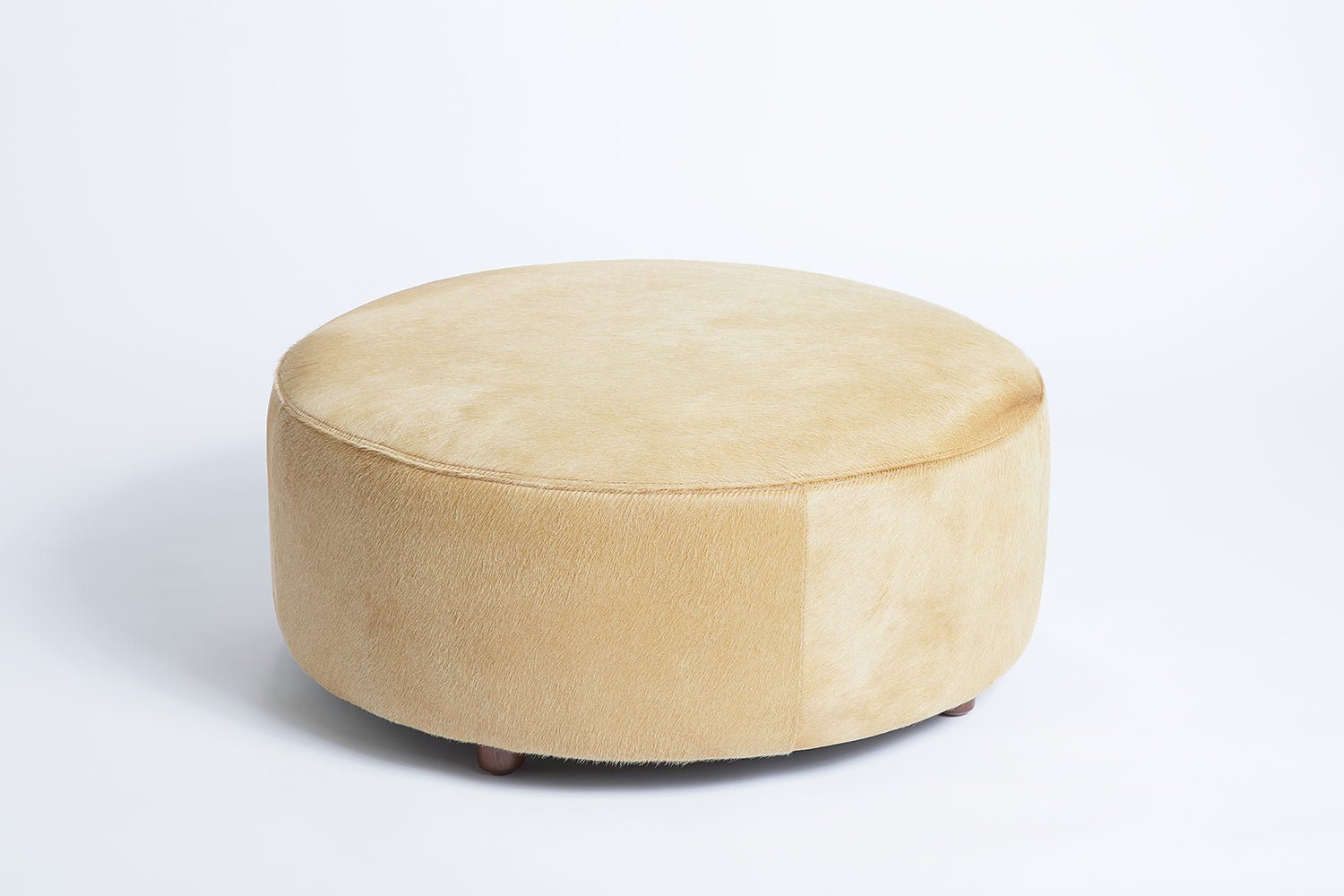Round Cowhide Ottoman - HearthHub